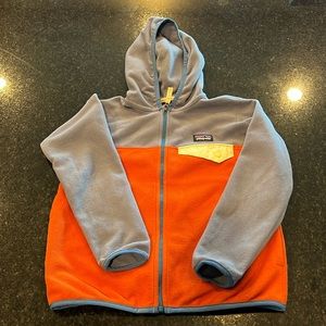 Hooded Patagonia Fleece with zipper in size extra small 5-6.